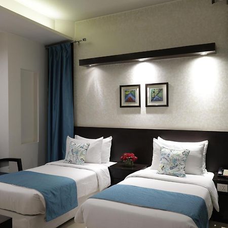 Rockland Hotel, C.R Park New Delhi Exterior foto
