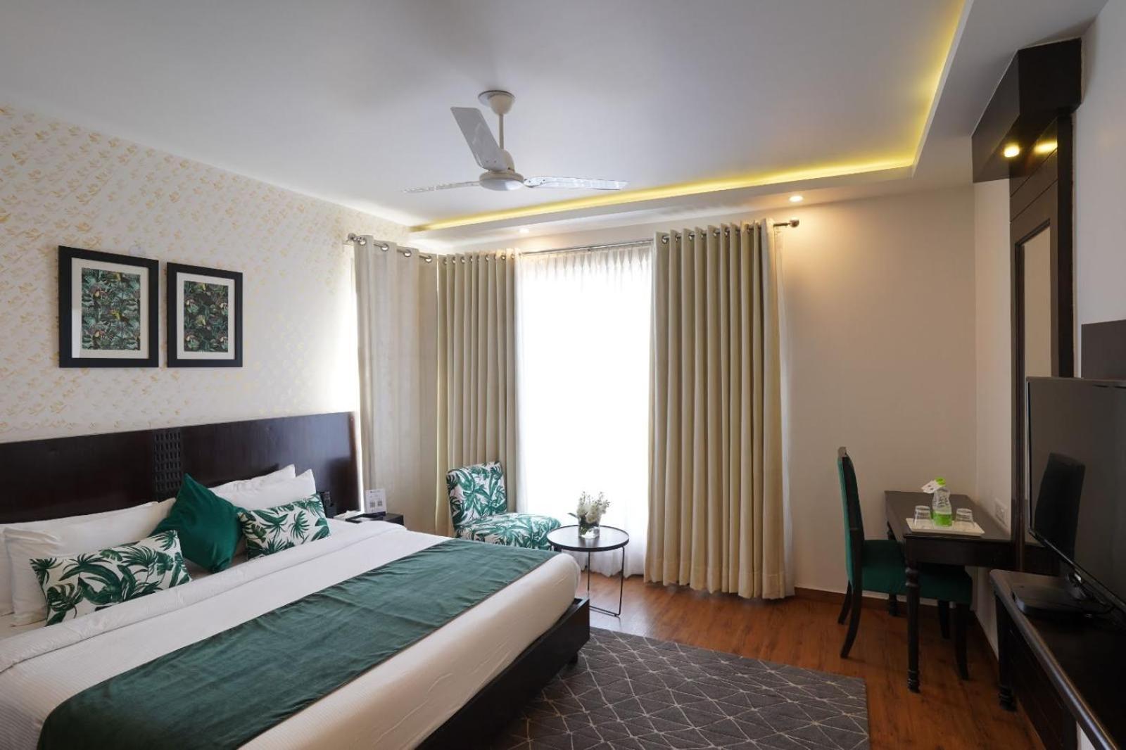 Rockland Hotel, C.R Park New Delhi Exterior foto