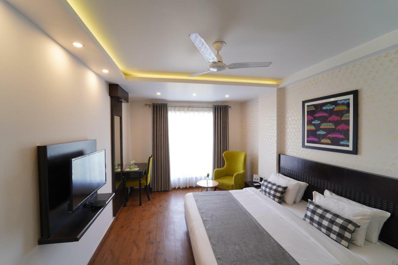 Rockland Hotel, C.R Park New Delhi Exterior foto